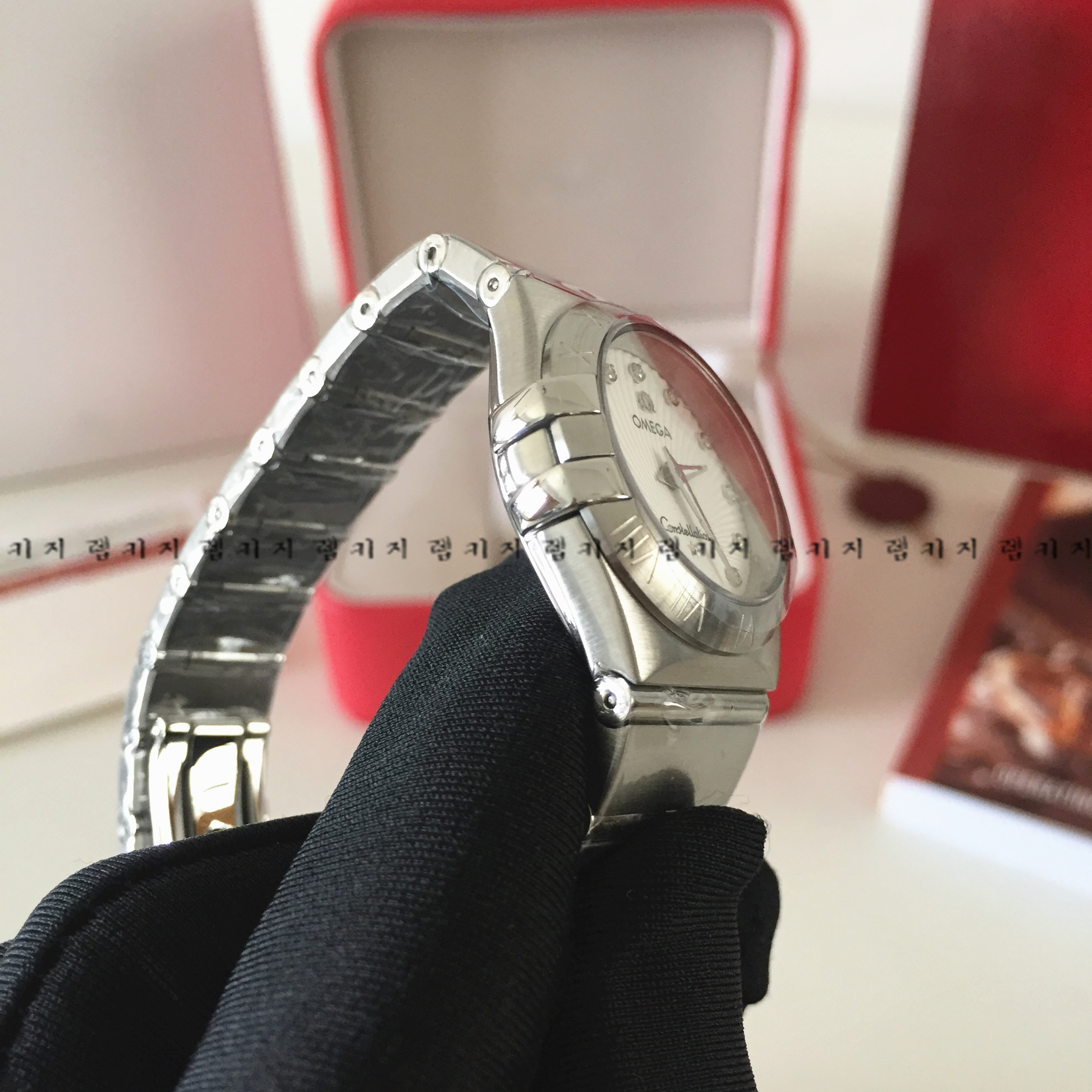 오메가 컨스틸레이션 은장 메탈시계 여성용